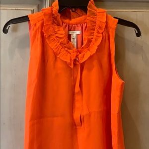 Bright orange collared top